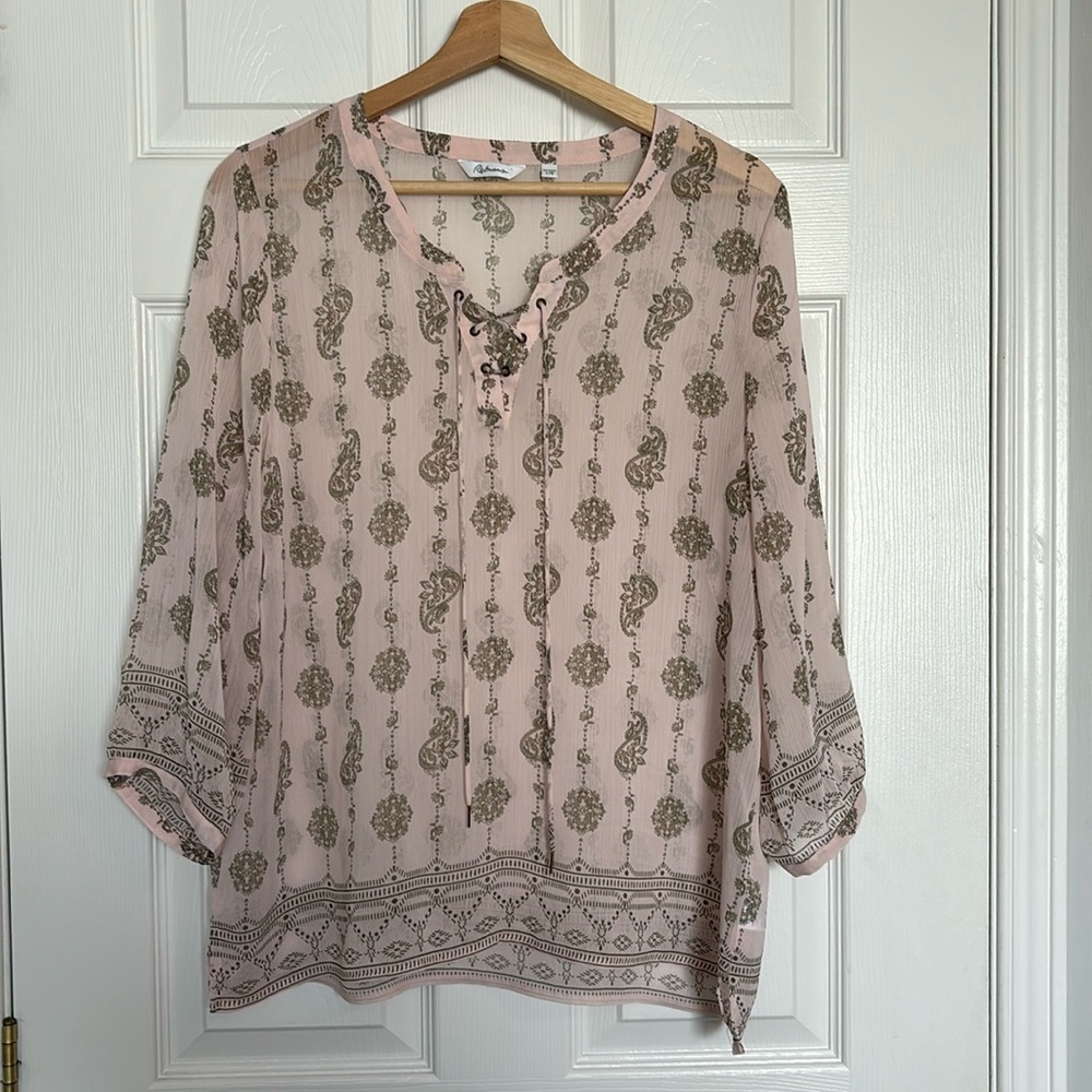 Reitman’s semi sheer tie neck blouse